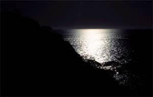 Moon light reflection off of the ocean, water appears black