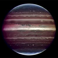 A 2008 image of Jupiter obtained by the Very Large Telescope in Chile shows a shift in high-level atmospheric haze compared with a 2005 image taken by the Hubble Space Telescope. The brightest haze has shifted southward by about 6,000 kilometers, probably in response to a global upheaval that began two years ago. The false color, infrared VLT image combines a series of images taken over 20 minutes on Aug. 17 by a Multi- Conjugate Adaptive Optics Demonstrator (MAD) prototype mounted on the telescope. The image sharpening corresponds to seeing details about 300 kilometers wide on the surface of the planet. <br /><br />Credit: ESO/F. Marchis, M. Wong, E. Marchetti, P. Amico, S. Tordo