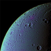 <p>
	This view highlights tectonic faults and craters on Dione, an icy world that has undoubtedly experienced geologic activity since its formation.</p>
<p>
	To create the enhanced-color view, ultraviolet, green and infrared images were combined into a single black and white picture that isolates and maps regional color differences. This 'color map' was then superposed over a clear-filter image. The origin of the color differences is not yet understood, but may be caused by subtle differences in the surface composition or the sizes of grains making up the icy soil.</p>
<p>
	This view looks toward the leading hemisphere on Dione (1,126 kilometers, or 700 miles across). North is up and rotated 20 degrees to the right.</p>
<p>
	See PIA07690 for a similar monochrome view.</p>
<p>
	All images were acquired with the Cassini spacecraft narrow-angle camera on Dec. 24, 2005 at a distance of approximately 151,000 kilometers (94,000 miles) from Dione and at a Sun-Dione-spacecraft, or phase, angle of 99 degrees. Image scale is 896 meters (2,940 feet) per pixel.</p>
