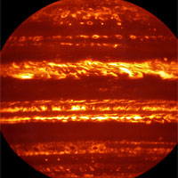 <p>Jupiter imaged using the VISIR instrument on the VLT<br />
In preparation for the imminent arrival of NASA’s Juno spacecraft in July 2016, astronomers used ESO’s Very Large Telescope to obtain spectacular new infrared images of Jupiter using the VISIR instrument. They are part of a campaign to create high-resolution maps of the giant planet to inform the work to be undertaken by Juno over the following months, helping astronomers to better understand the gas giant.<br />
<br />
This false-colour image was created by selecting and combining the best images obtained from many short VISIR exposures at a wavelength of 5 micrometres.<br />
<br />
Credit: ESO/L. Fletcher</p>
