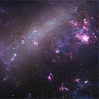 Astronomers have measured the 3-D velocities of the Large Magellanic Cloud (shown here) and the Small Magellanic Cloud. They found surprisingly high speeds, which may indicate that the Milky Way is twice as massive as previously thought, or that the Magellanic Clouds are not gravitationally bound to the Milky Way but instead are 'just passing through.' <br /><br />(Copyright Robert Gendler and Josch Hambsch 2005)<br />