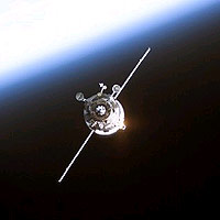 Backdropped by the blackness of space and Earth’s horizon, an unmanned Progress supply vehicle approaches the Pirs Docking Compartment (out of frame) attached to the Zvezda Service Module on the International Space Station (ISS), completing a three-day automated flight. The Progress 11 resupply craft, which launched from the Baikonur Cosmodrome in Kazakhstan on 8 June 2003, carried more than two tons of food, fuel, water, supplies and scientific gear for the Expedition 7 crew aboard the Station. The Progress docked with ISS at 13:17 CET on 11 June 2003. 
<P>
Credits: NASA