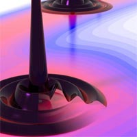 <p>
	Artist's conception of microscopic 'quantum droplet' discovered by JILA physicists in a gallium-arsenide semiconductor excited by an ultrafast red laser pulse. Each droplet consists of electrons and holes (representing absent electrons) arranged in a liquid-like pattern of rings. The surrounding area is plasma. The discovery adds to understanding of how electrons interact in optoelectronic devices. Credit: Brad Baxley/JILA</p>
