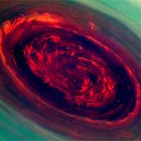 <p>
	The spinning vortex of Saturn's north polar storm resembles a deep red rose of giant proportions surrounded by green foliage in this false-color image from NASA's Cassini spacecraft. Measurements have sized the eye at a staggering 1,250 miles (2,000 kilometers) across with cloud speeds as fast as 330 miles per hour (150 meters per second).</p>
<p>
	This image is among the first sunlit views of Saturn's north pole captured by Cassini's imaging cameras. When the spacecraft arrived in the Saturnian system in 2004, it was northern winter and the north pole was in darkness. Saturn's north pole was last imaged under sunlight by NASA's Voyager 2 in 1981; however, the observation geometry did not allow for detailed views of the poles. Consequently, it is not known how long this newly discovered north-polar hurricane has been active.</p>
<p>
	The images were taken with the Cassini spacecraft narrow-angle camera on Nov. 27, 2012, using a combination of spectral filters sensitive to wavelengths of near-infrared light. The images filtered at 890 nanometers are projected as blue. The images filtered at 728 nanometers are projected as green, and images filtered at 752 nanometers are projected as red. In this scheme, red indicates low clouds and green indicates high ones.</p>
<p>
	The view was acquired at a distance of approximately 261,000 miles (419,000 kilometers) from Saturn and at a sun-Saturn-spacecraft, or phase, angle of 94 degrees. Image scale is 1 mile (2 kilometers) per pixel.</p>
