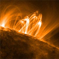 Close-up images reveal an active surface with coronal loops emerging and disappearing all over the Sun's surface and can span a length of about 250,000 miles, or about 30 times the diameter of Earth. 
<P>
Taken by the Solar and Heliospheric Observatory (SOHO) spacecraft on April 21.
<P>
SUPER: NASA / LMSAL