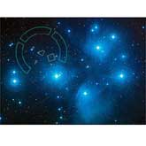 The brilliant stars seen in this image are members of the popular open star cluster known as the Pleiades, or Seven Sisters.